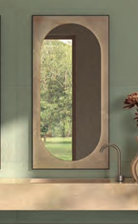 Portale mirror on sage green wall overlooking the garden, matching washbasin and natural floral decorations.