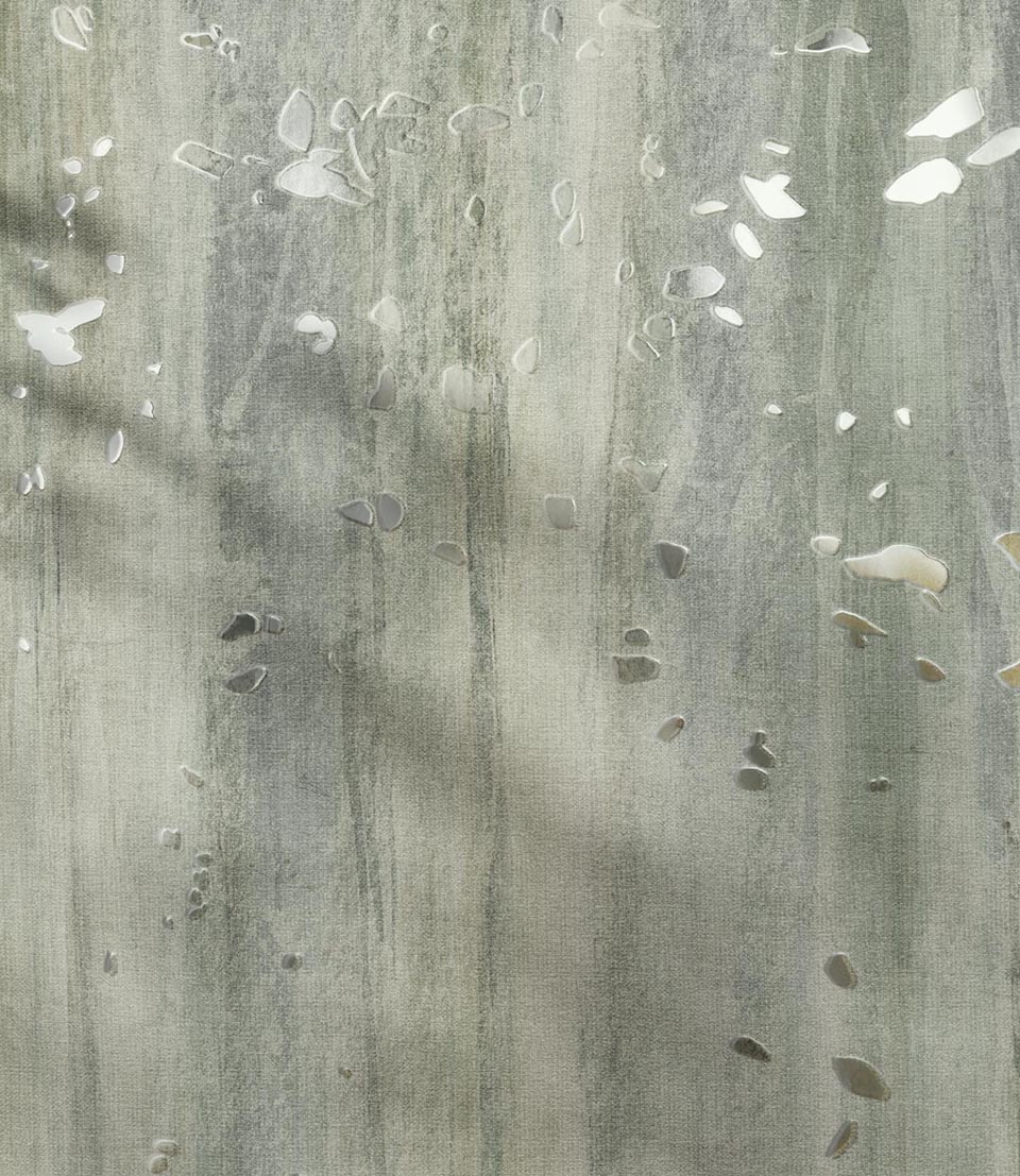 Decorative textured wall with green-grey watercolour effect and glossy inserts simulating petals on a textured background.