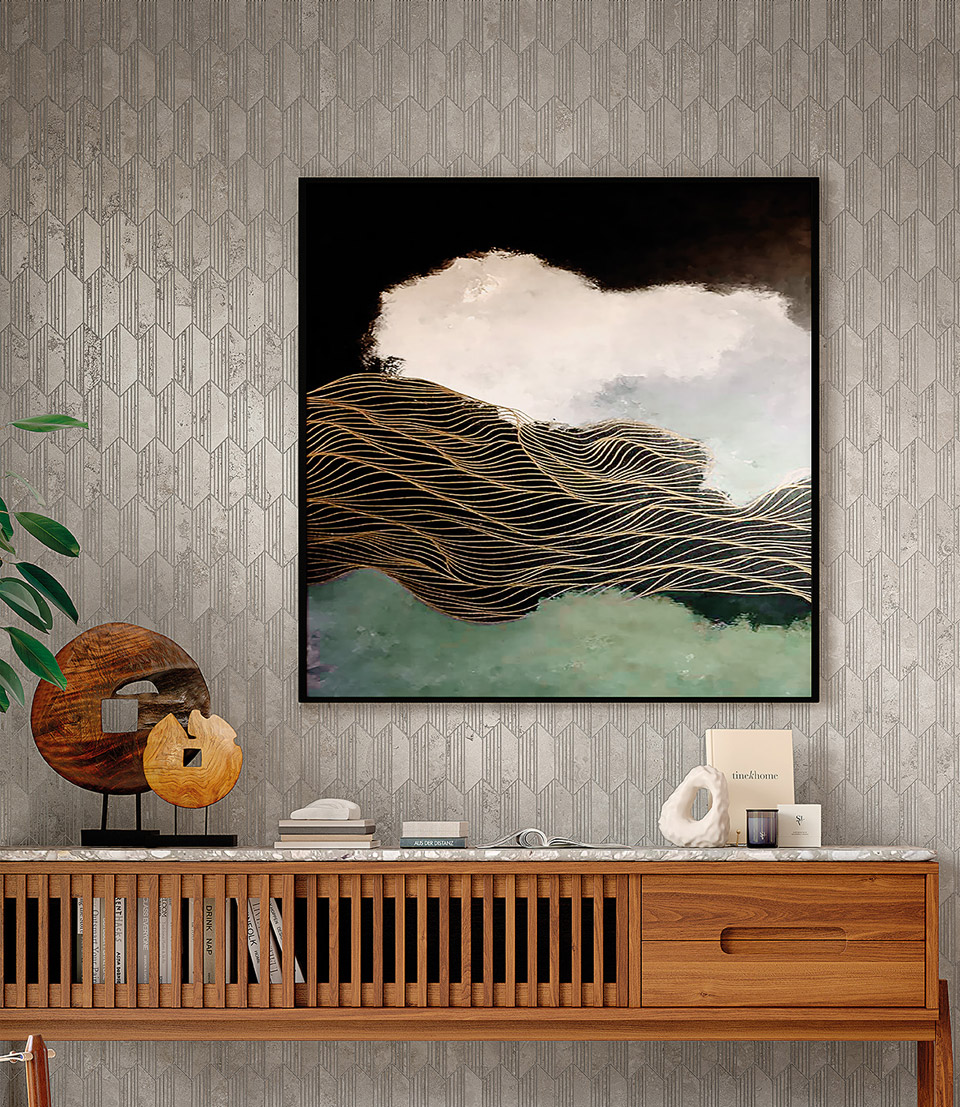 Textured stoneware wall with grey geometric decoration, natural wood furniture and abstract painting in black, gold and green tones.