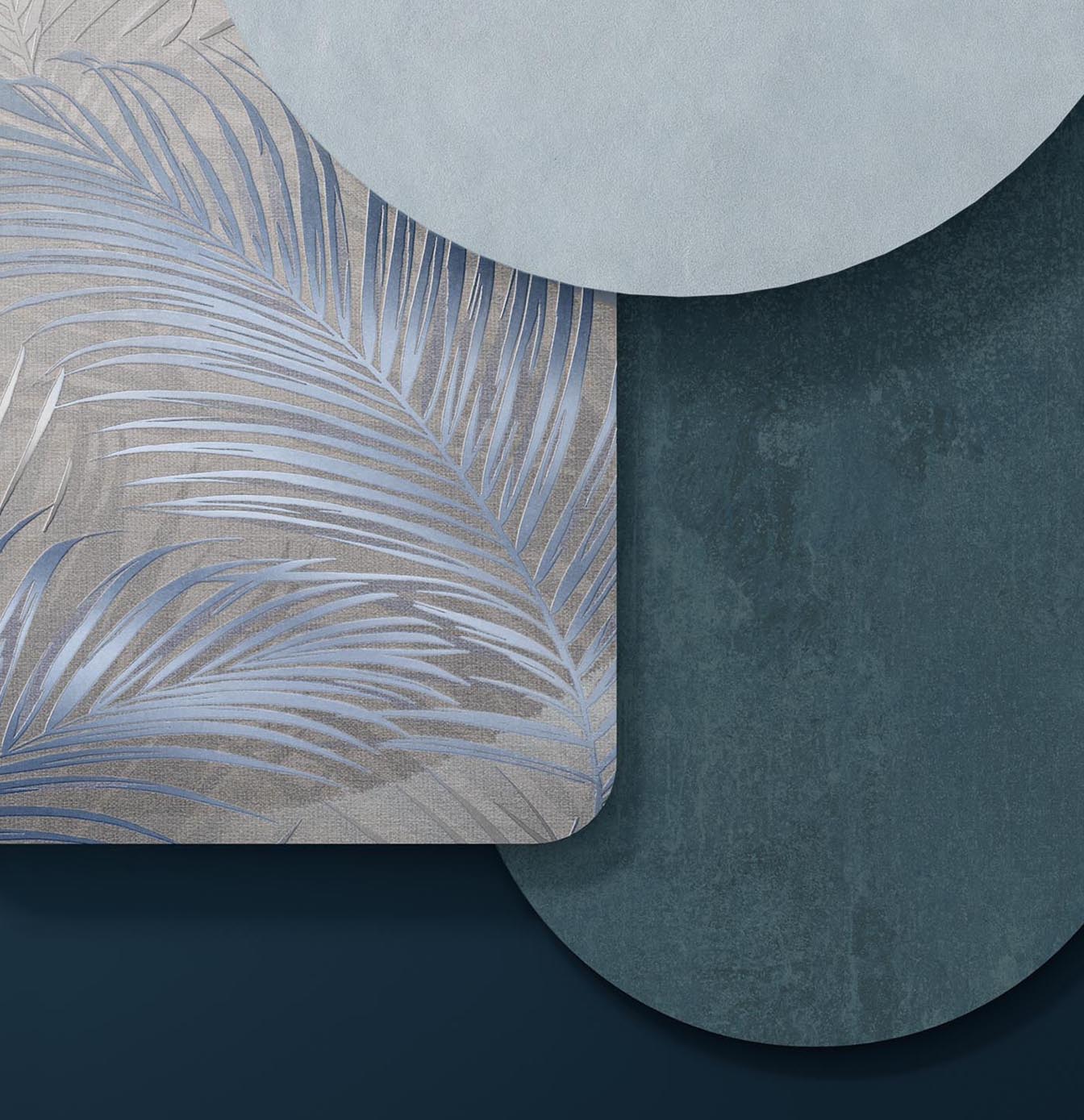 Ceramic mood board with leaf decoration, matt and textured surfaces in shades of blue and powder blue.