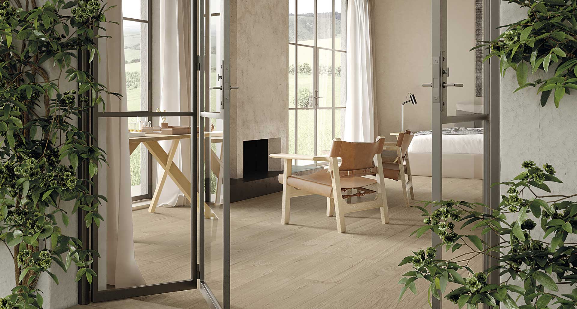 Living room with beige wood effect floor, light wood furniture, armchairs and fireplace, view of green landscape from large windows.