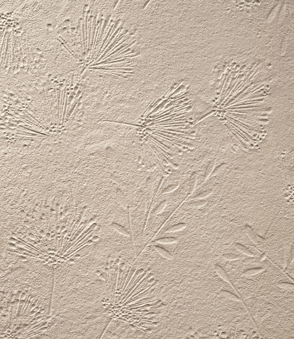 Sand-colored ceramic tile with etched botanical pattern, textural texture and elegant, natural handcrafted finish.