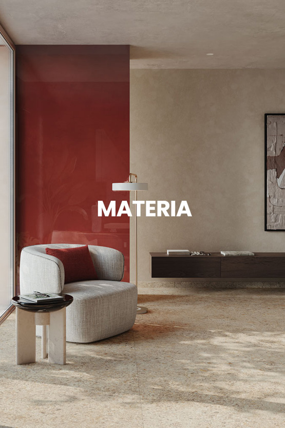 Living room with beige terrazzo-effect flooring, glossy red wall, grey armchair with red cushion and dark wood wall-mounted furniture.