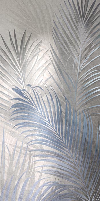 Ceramic decoration with blue tropical leaf motif on a light grey background.