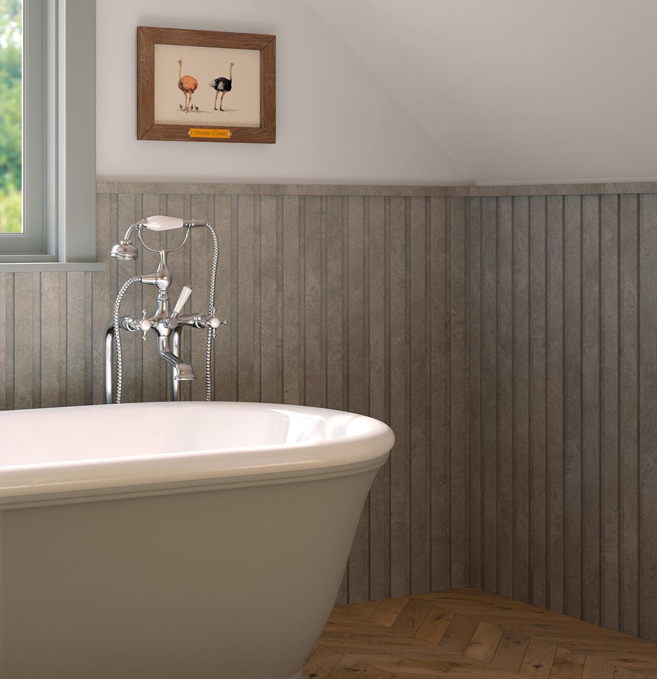 Bathroom with freestanding bathtub in classical style with dove grey vertical stone effect stoneware wall paneling and wood effect floor plug.